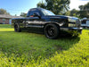 Chevy Silverado with Cosmis Wheels XT-206R Black Pearl 22x10 +0 6×139.7