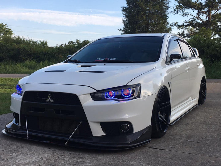 Mitsubishi Evolution with Aftermarket Cosmis Wheels Black S5R 18x9 +26mm 5x114.3