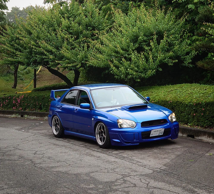 WRB Subaru STI with Cosmis XT-006R Gunmetal 18x9 +30mm 5x114.3 Wheels