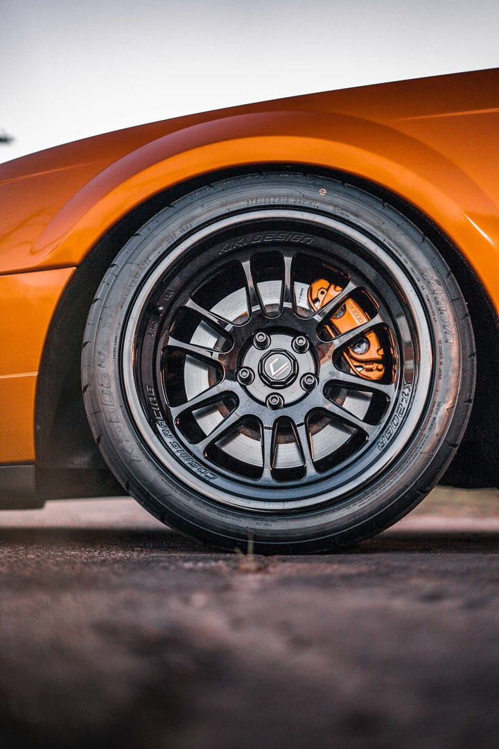 SN95 4th Gen Ford Mustang Cobra with Front Aftermarket Cosmis Wheels XT-206R Black 18x9.5 +10mm