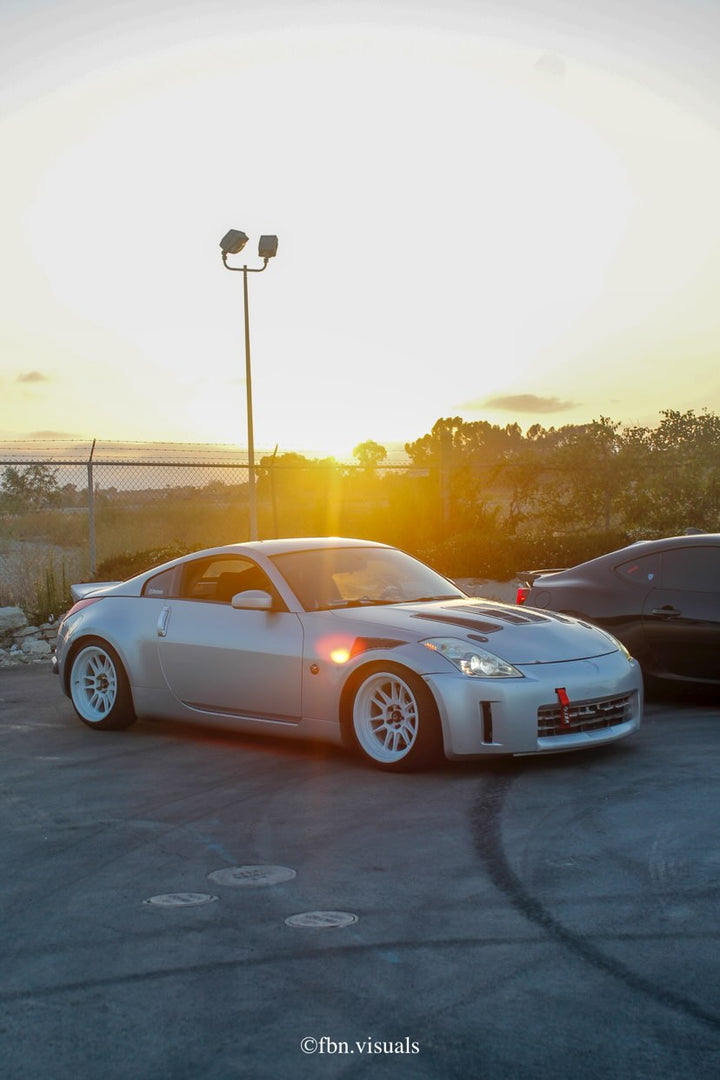 Nissan 350z with Cosmis Wheels XT-206R White 18x9.5 +10mm