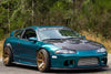 2nd Gen Mitsubishi Eclipse with Aftermarket Cosmis Wheels S1 bronze 18x10.5 +5mm