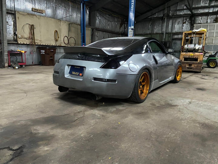 Lowered Nissan 350z with Aftermarket Cosmis Wheels XT-006R 18x9.5 +10mm 5x114.3 Squared in Hyper Gold