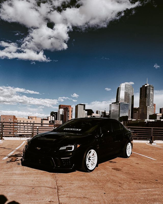 Subaru WRX with Cosmis MRII White Wheels 18x9.5 +15mm 5x114.3