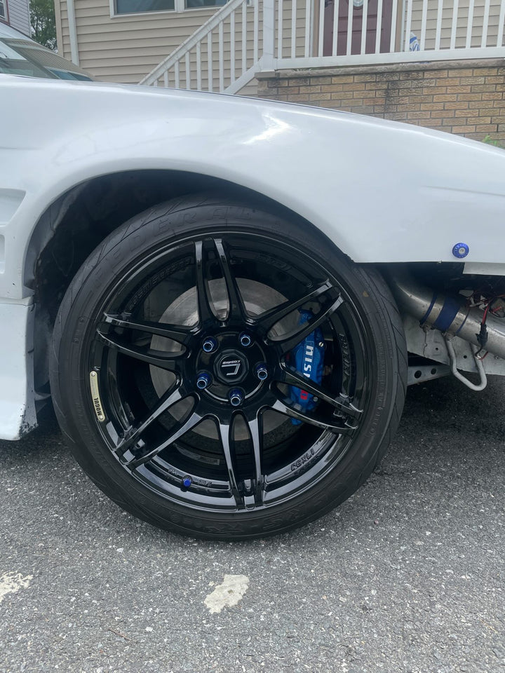 Widebody Nissan 240sx S14 with Aftermarket Cosmis Wheels MRII Black 17x9 +10 and 25mm Spacers