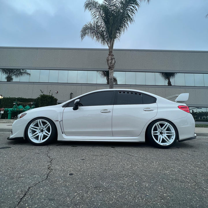 Subaru WRX STI with Cosmis MRII White Wheels 18x9.5 +15mm 5x114.3