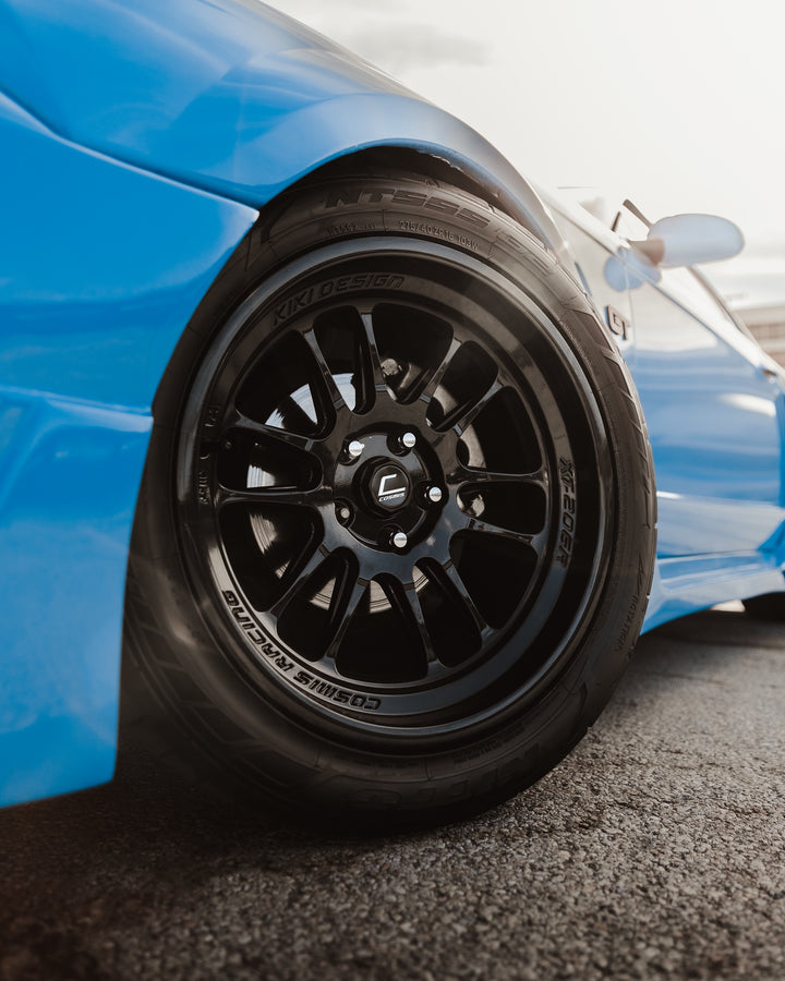 SN95 4th Gen Ford Mustang with Front Aftermarket Cosmis Wheels XT-206R Black 18x9.5 +10mm