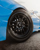 SN95 4th Gen Ford Mustang with Front Aftermarket Cosmis Wheels XT-206R Black 18x9.5 +10mm